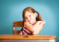 schoolgirl at desk